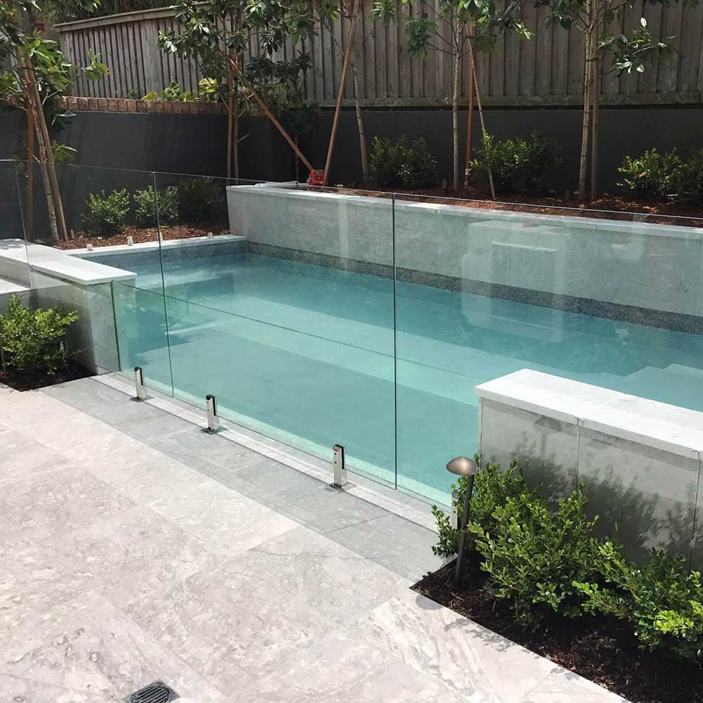 Grey Sky Limestone 400x400x30/60mm Drop Nose Coping - 1st Quality - Picture Laid around Swimming Pool - Available at iPave Natural Stone